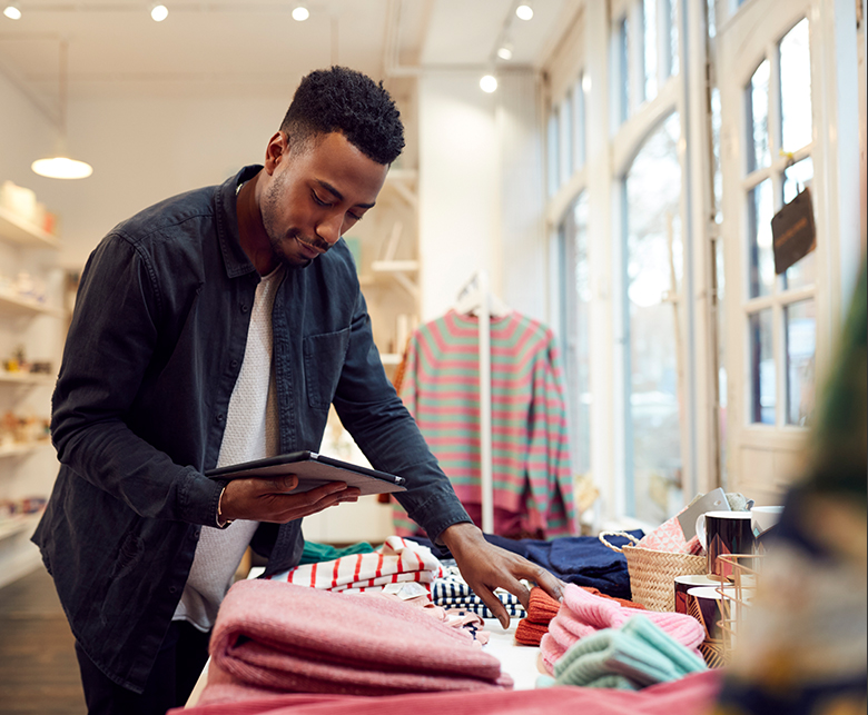 Man using tablet shopping